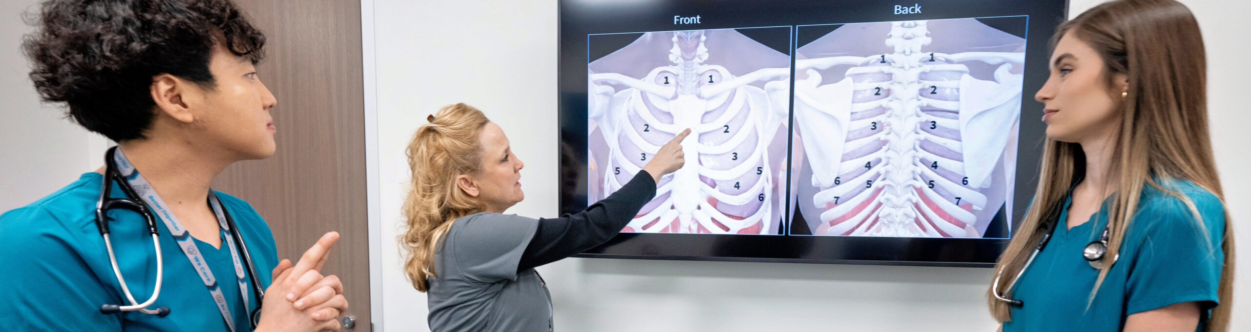 HSC Nursing Professor Showing Two Students a Chest X Ray