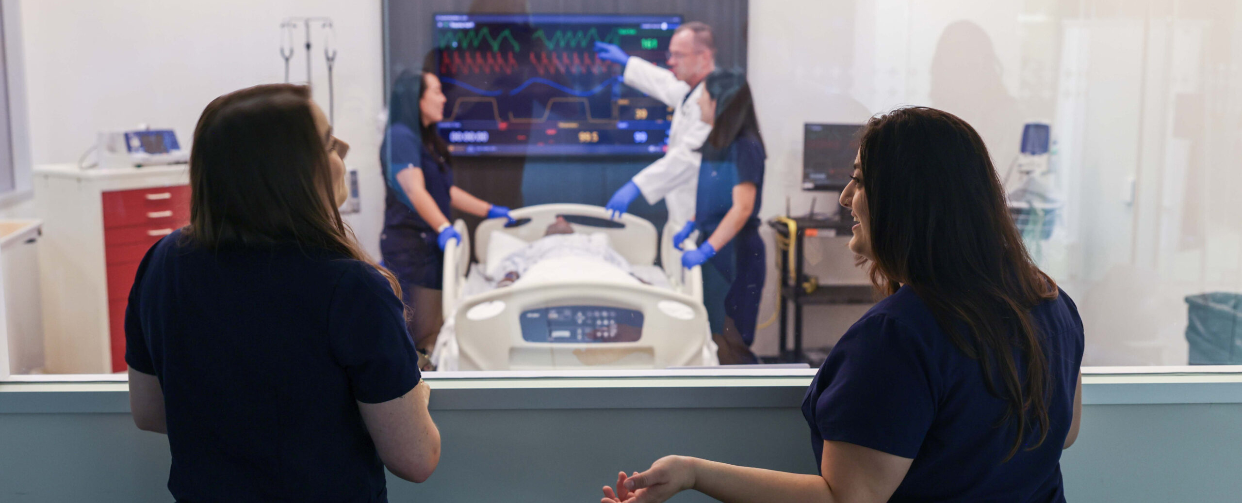 Physician Assistant students train in the simulation lab.