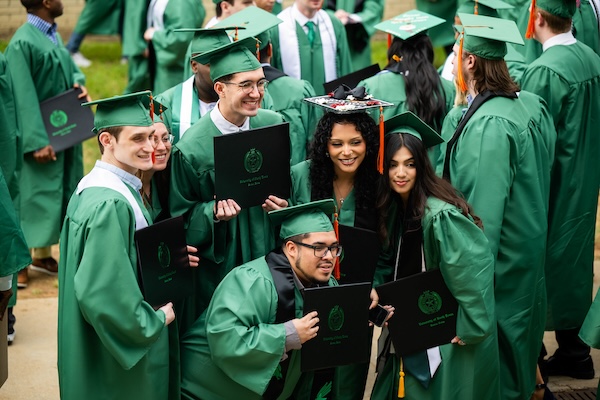 UNT students pose for photos