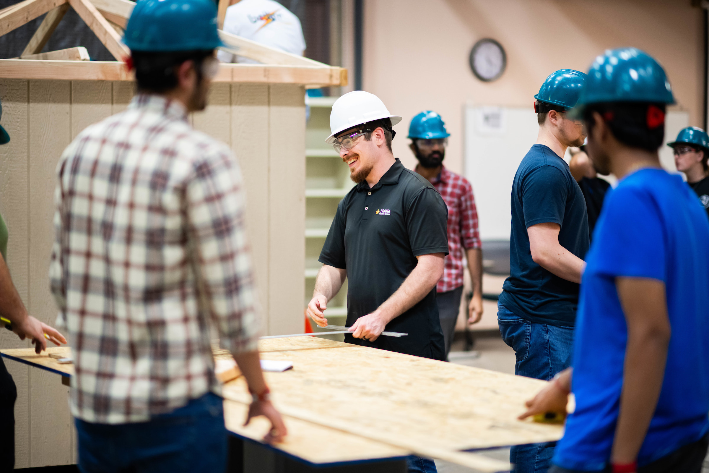 Jones and others working on the tiny home project