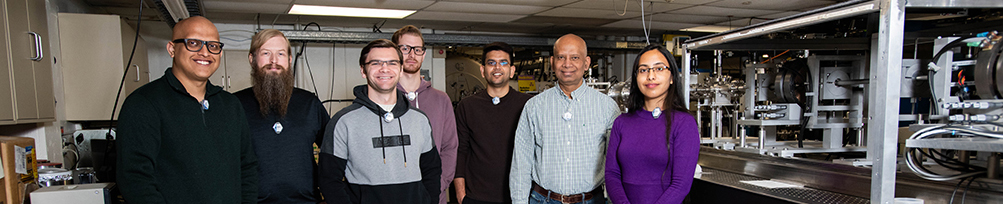 UNT Physics professor Bibhudutta Rout with his team of student researchers in the Ion Beam Laboratory