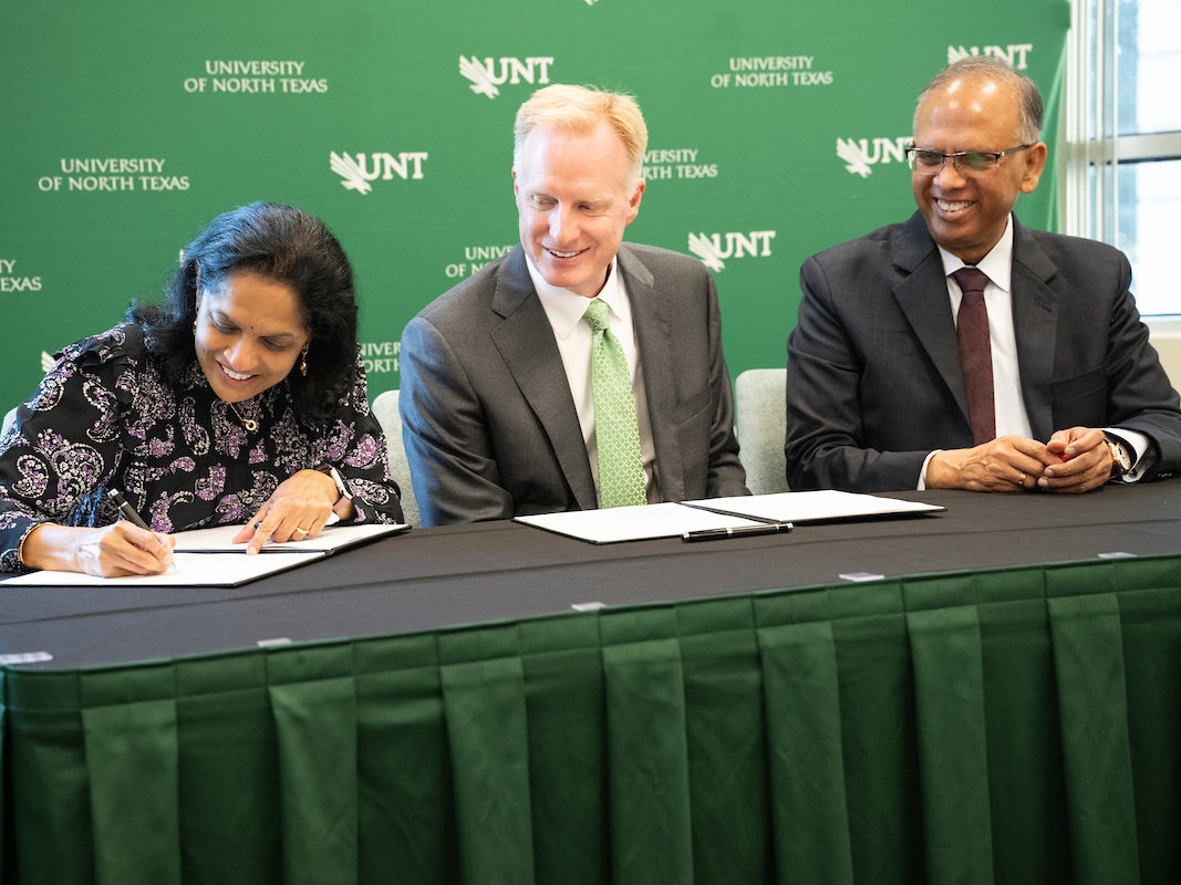 Anuradha Sinha, UNT President Harrison Keller and Vikas Sinha