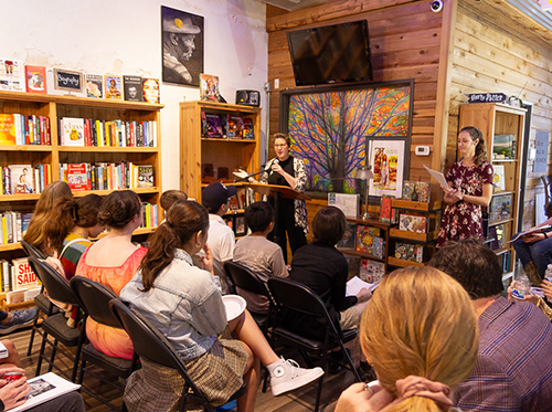 EXPO teacher Amy Taylor (left) and previous WITS instructor Madison Garber (right) at the Spring 2024 WITS book launch