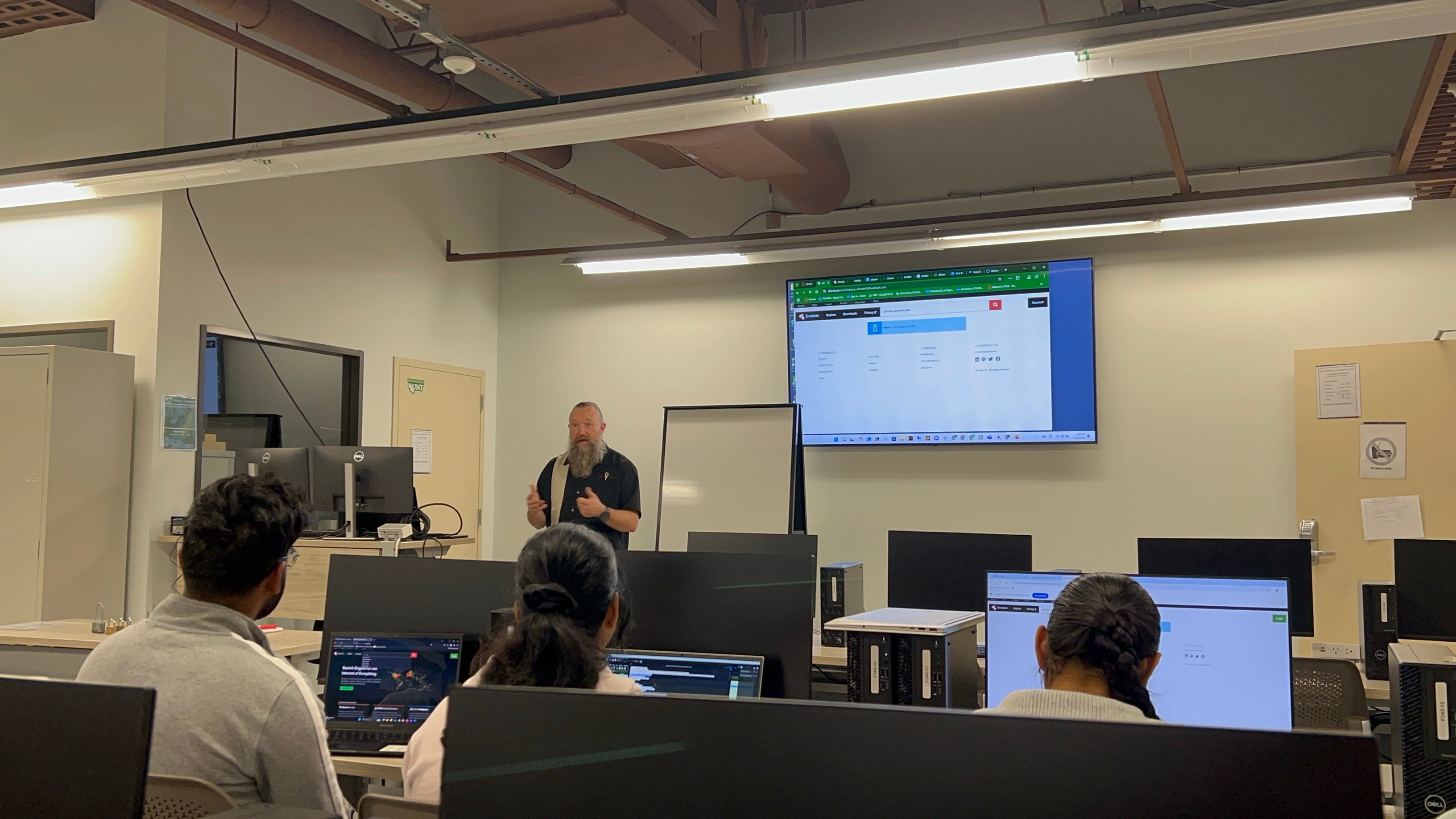 UNT adjunct faculty member Mark Hoffman teaching during a Cyber Security Penetration Testing class