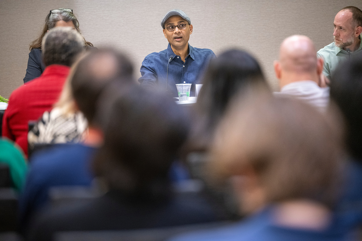 Cassini Nazir on a research day panel