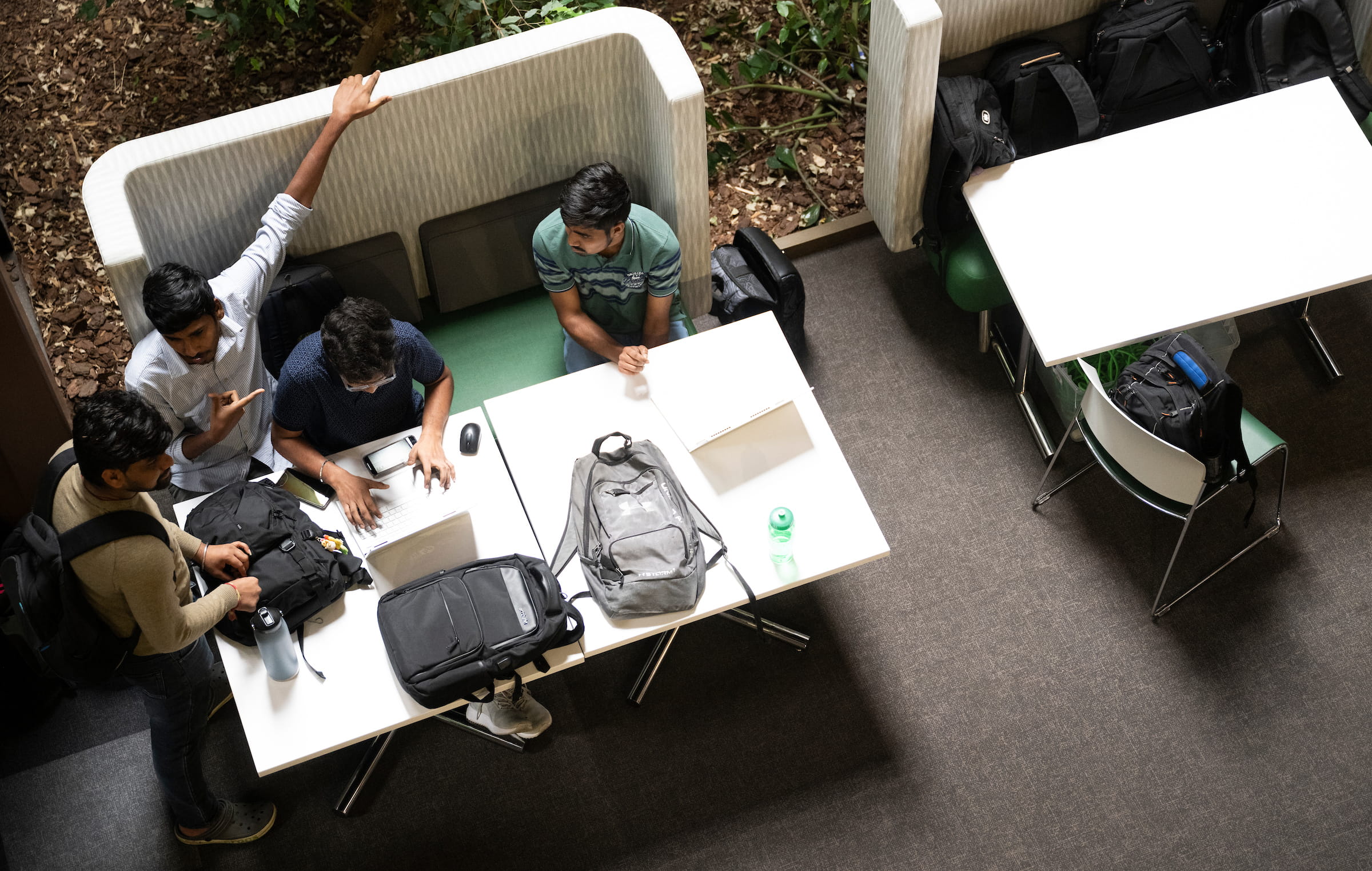 Students working at a table in Discovery Park 