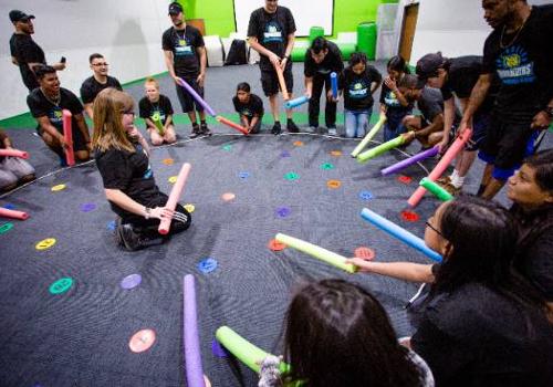 UNT Dallas Students Participate in a Group Exercise at a Presidential Scholars Retreat 