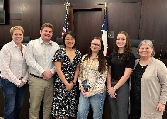 Coaches Shannon Conway (left) and Cynthia Fountaine (right) Beside the 2024 UNT Dallas College of Law Nuremberg Moot Court Team 