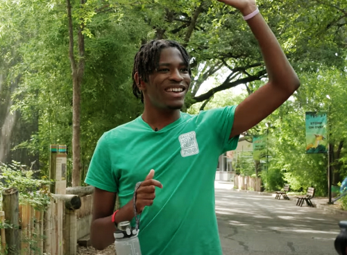 Dalon Moore Waves to Co-Workers and Guests at the Dallas Zoo 