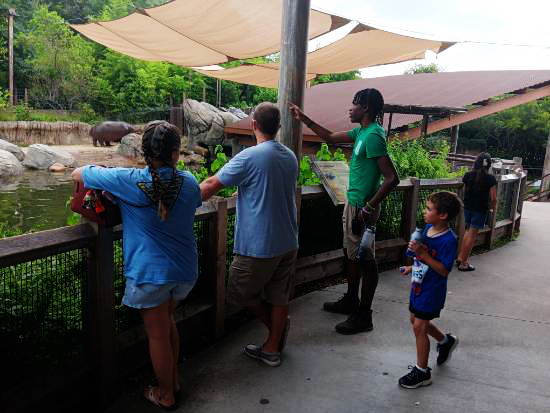 Dalon Moore Educating Visitors About an Exhibit at the Dallas Zoo 