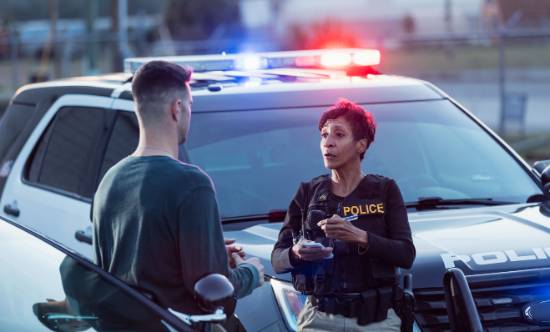 A Police Officer Interviews Witness