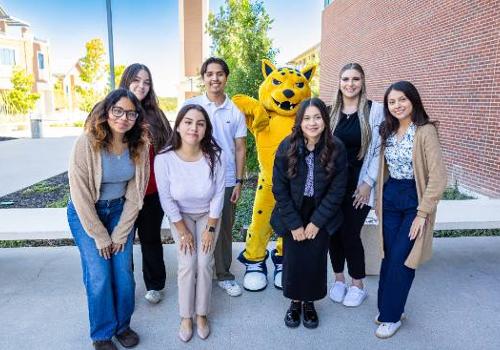 The 2024-25 Cohort of UNT Dallas Presidential Scholars, Along with Trailblazers Mascot Jax