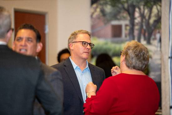 UNT President Dr. Warren von Eschenbach speaks with other Dallas-area higher education leaders at the signing ceremony for the Dallas Transfer Collaborative