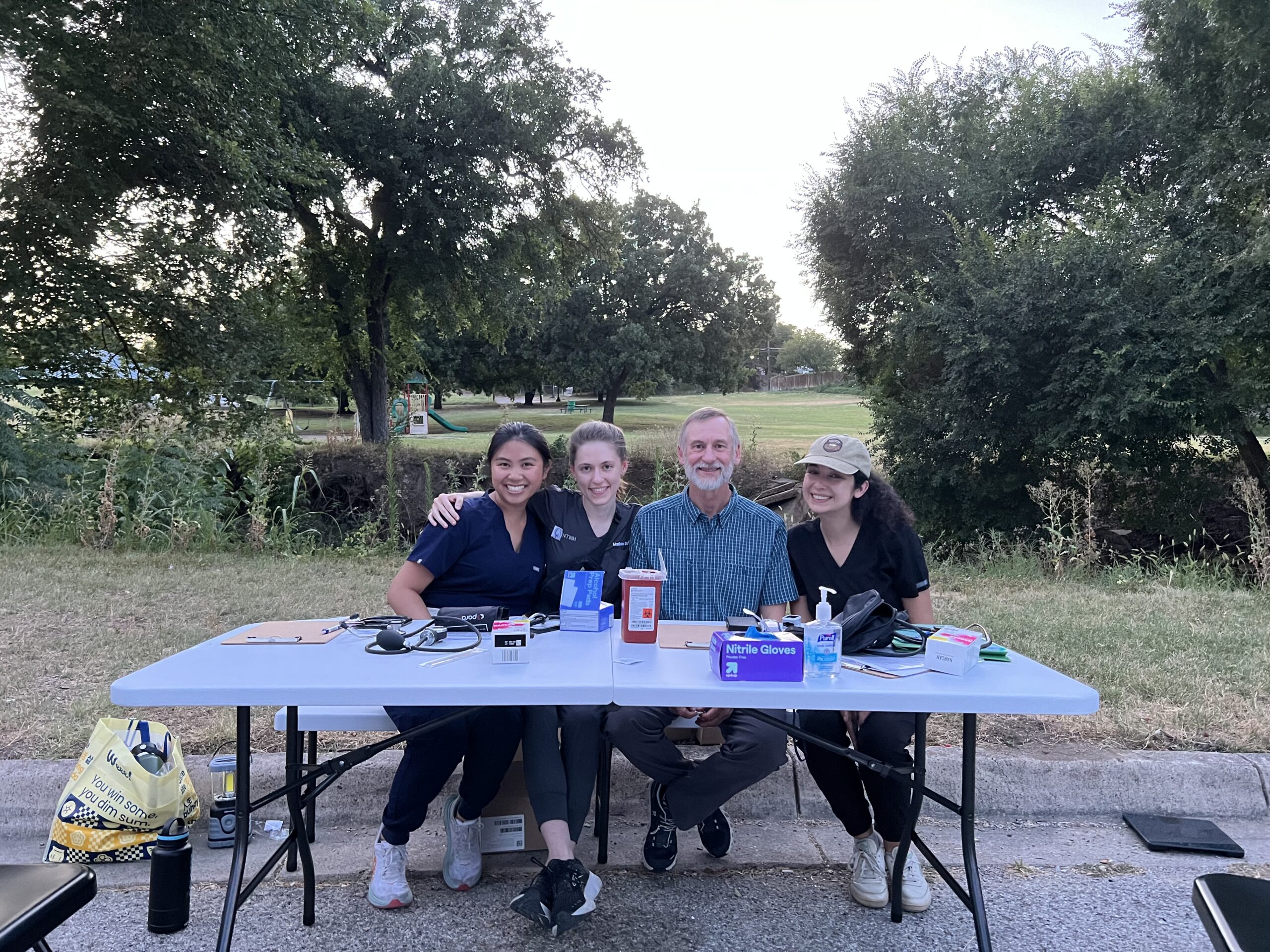 Student volunteers pose with Dr. Christopher Rheams